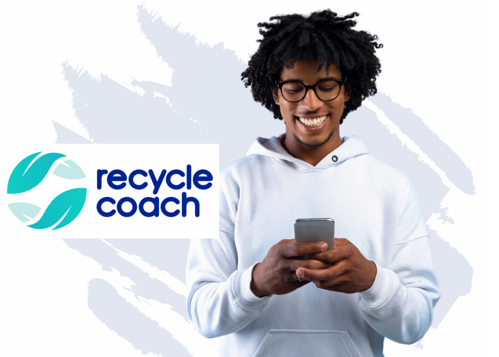 man looking at his phone and smiling with Recycle Coach logo