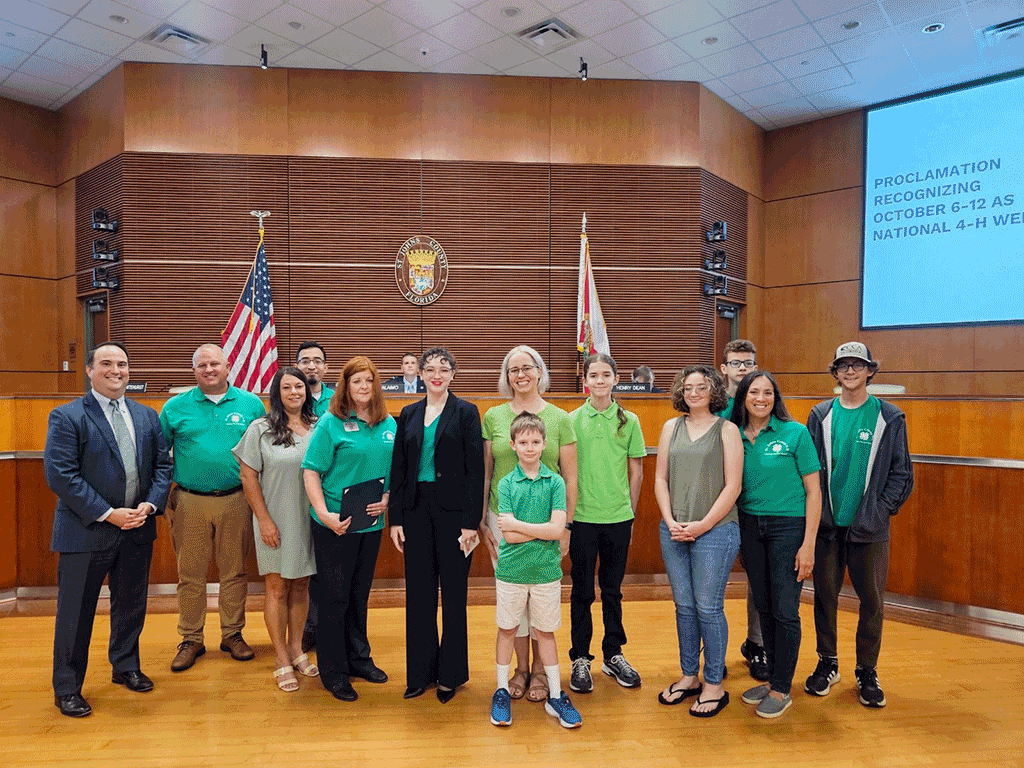 Commissioner Christian Whitehurst, representatives from UF IFAS Extension St. Johns County 4-H