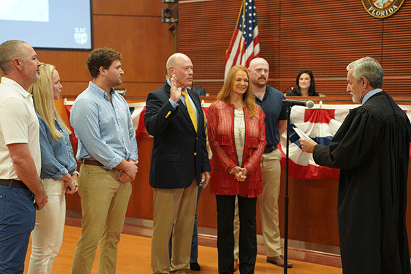 Commissioner Clay Murphy taking oath