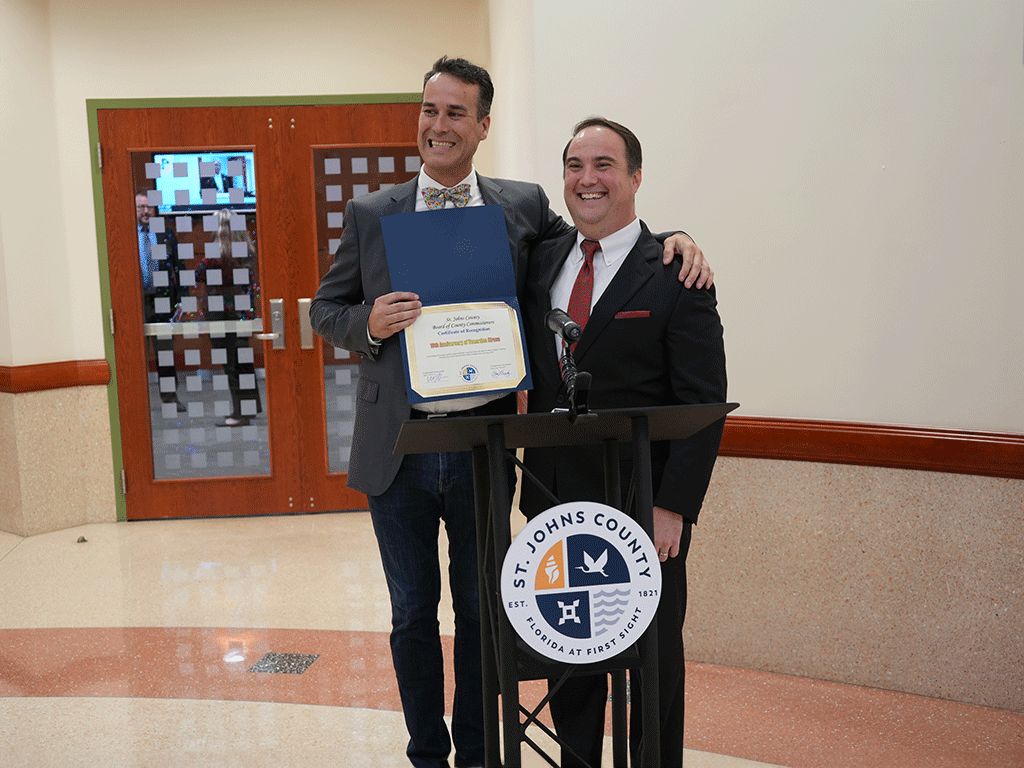 Commissioner Whitehurst and Kevin Venardos with the Certificate of Recognition