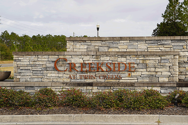 The entrance monument for the Creekside at Twin Creeks neighborhood.