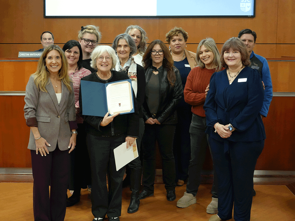 Commissioner Taylor with Kelly Franklin and Cathie Altman, holding the Human Trafficking Awareness Month proclamation.