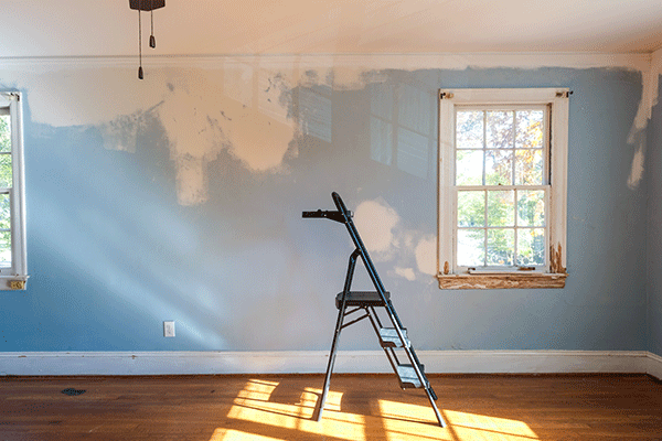 step ladder in empty room during home repairs