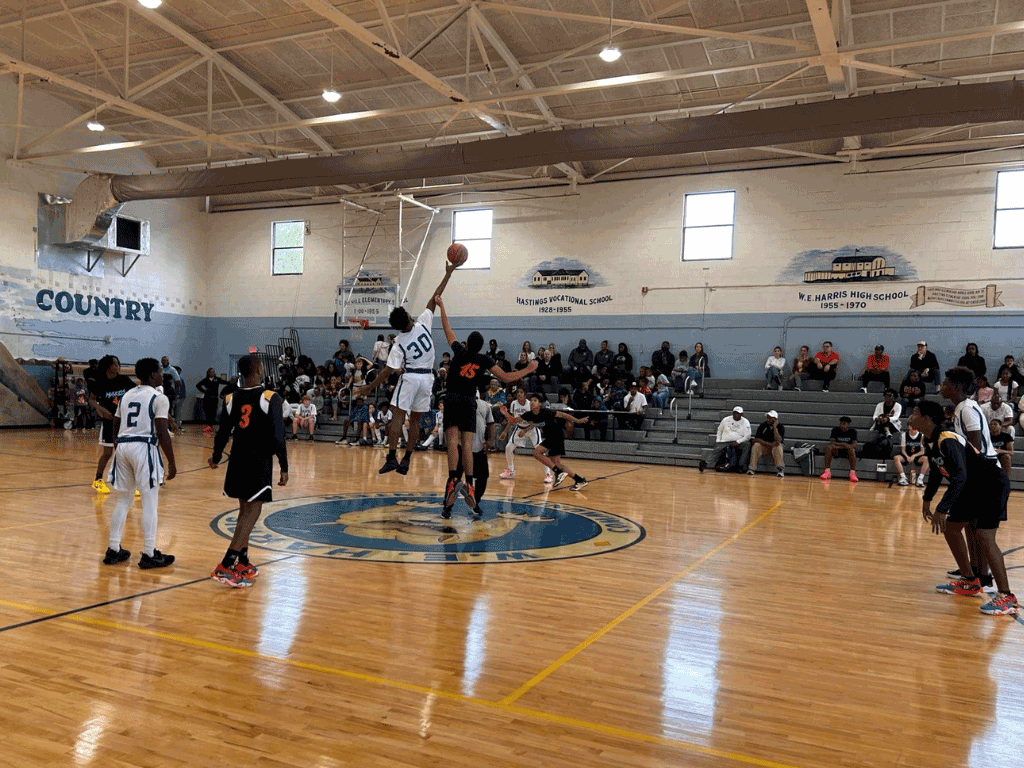 a youth basketball game in a gymnasium.